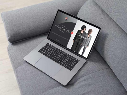 MacBook Pro On Sofa Mockup