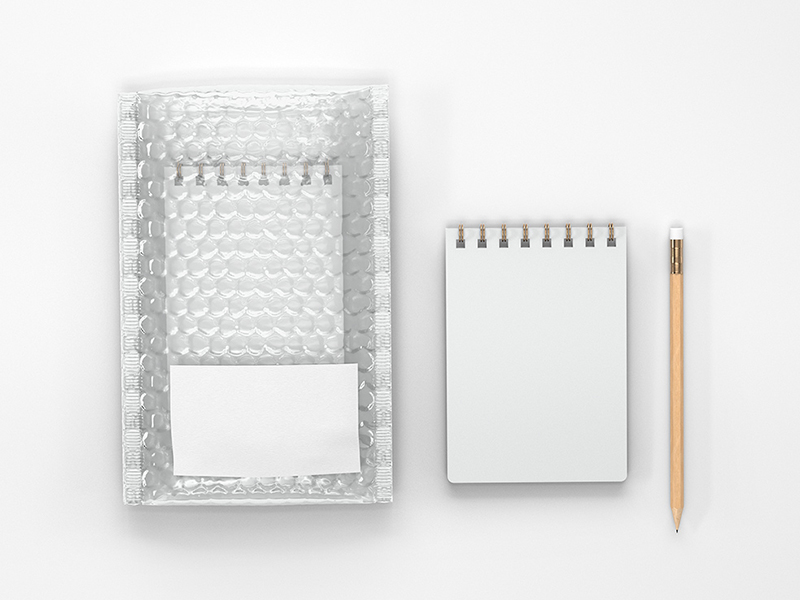 Free Bubble Envelope and Notebook Mockup