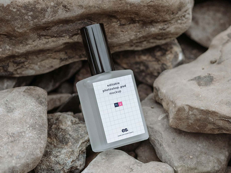 Perfume Bottle on Rocks Mockup