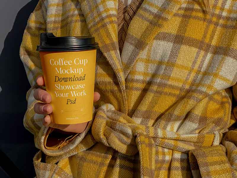 Man Holding Coffee Cup Mockup