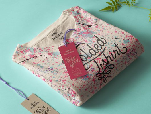 Folded T-shirt and Tag Mockup