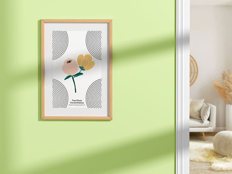 Free Wooden Photo Frame on Wall Mockup