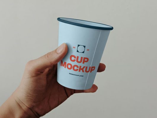 Free Paper Cup in Hand Mockup