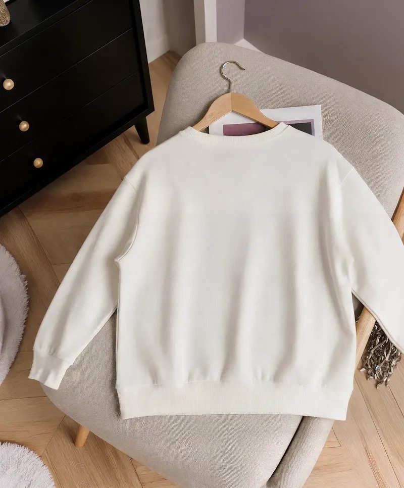 Back Side Sweatshirt Mockup on Lounge Chair