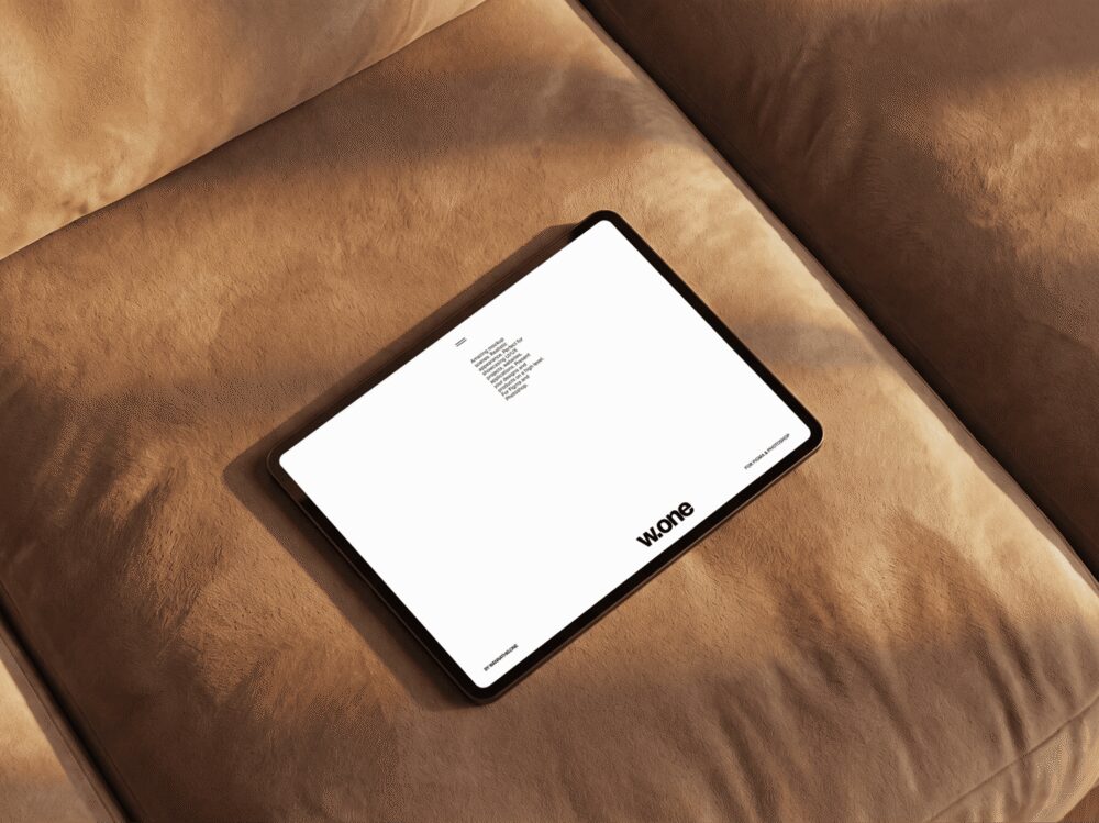 iPad Mockup on Leather Sofa
