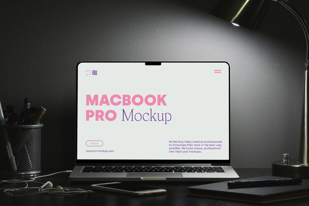 MacBook Pro on Black Desk Mockup