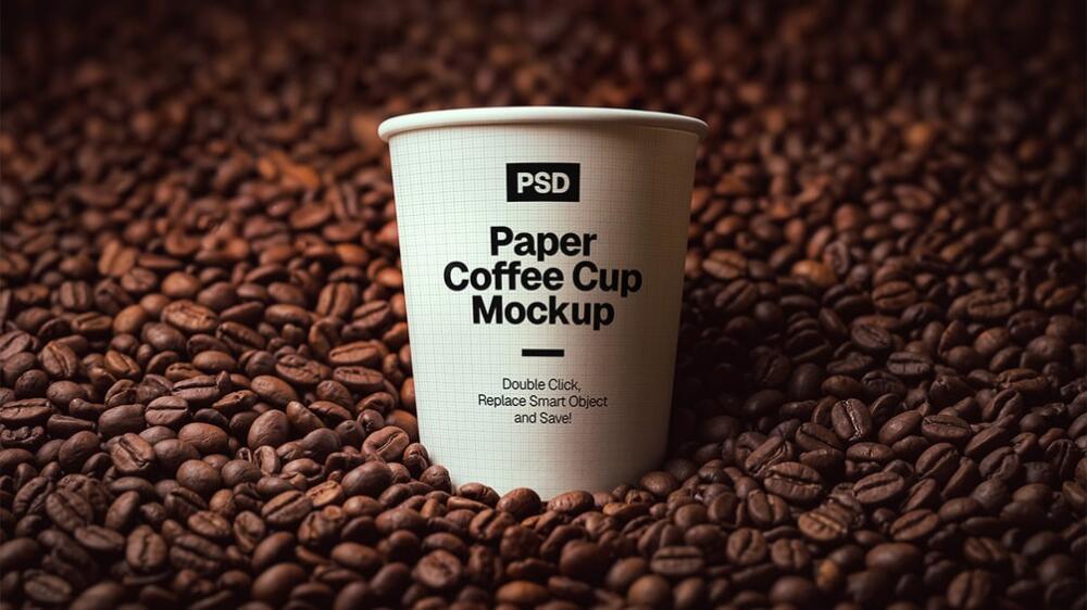Paper Coffee Cup Mockup on Roasted Coffee Beans