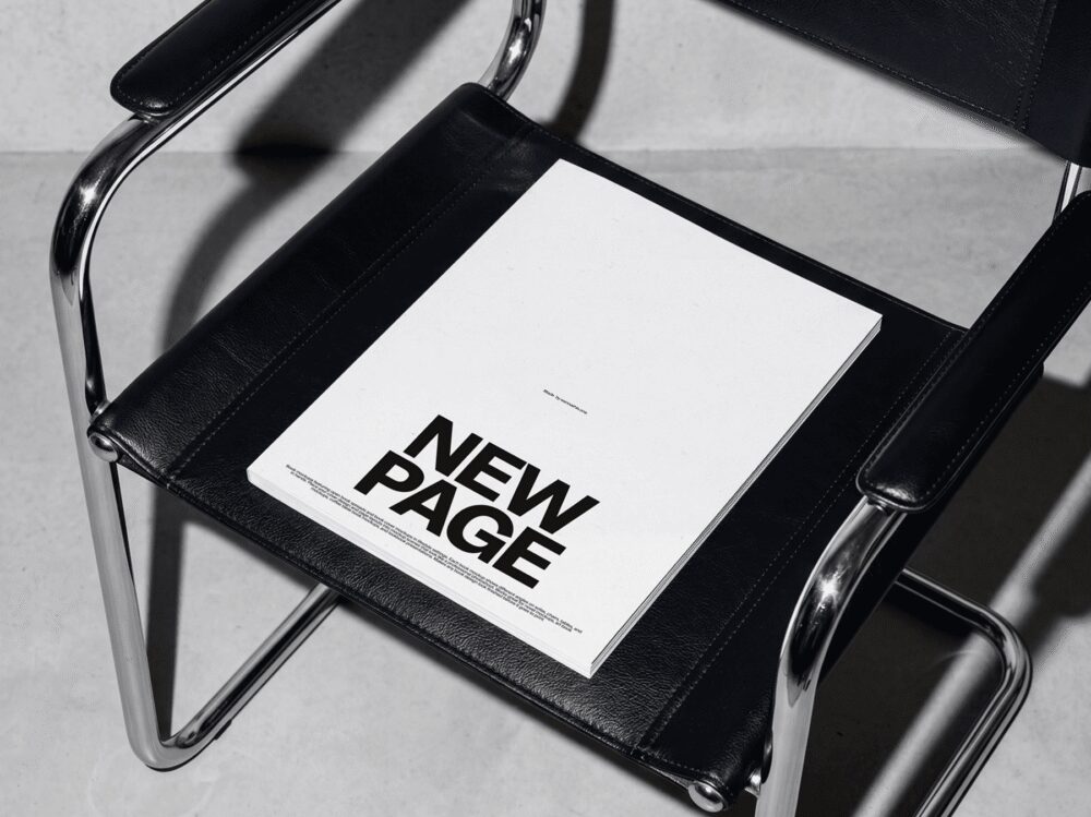 Softcover Book Cover on Chair Mockup