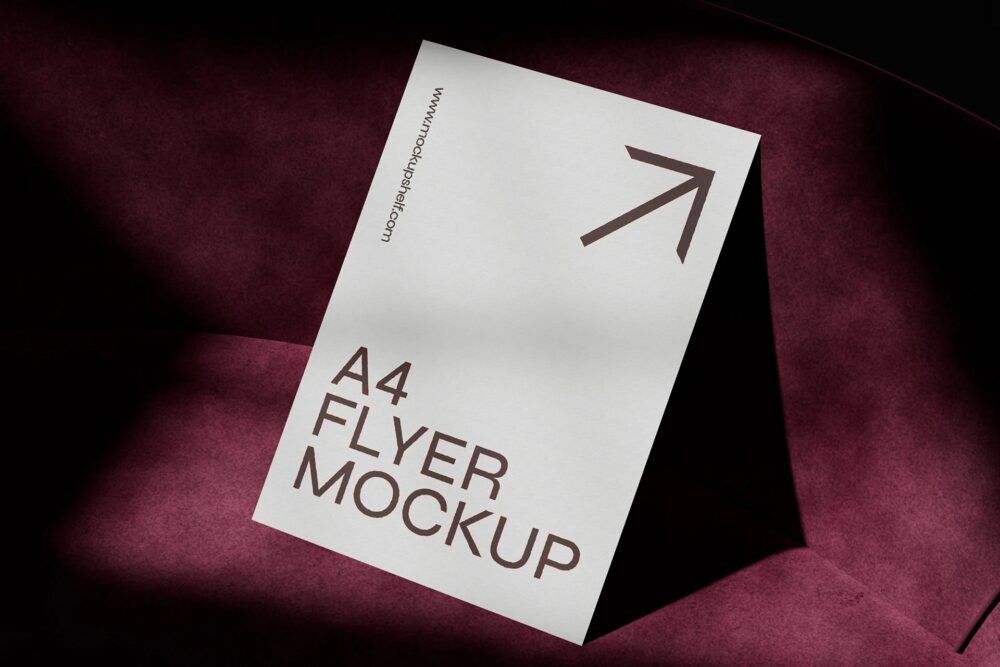 A4 Flyer Mockup on a Velvet Sofa