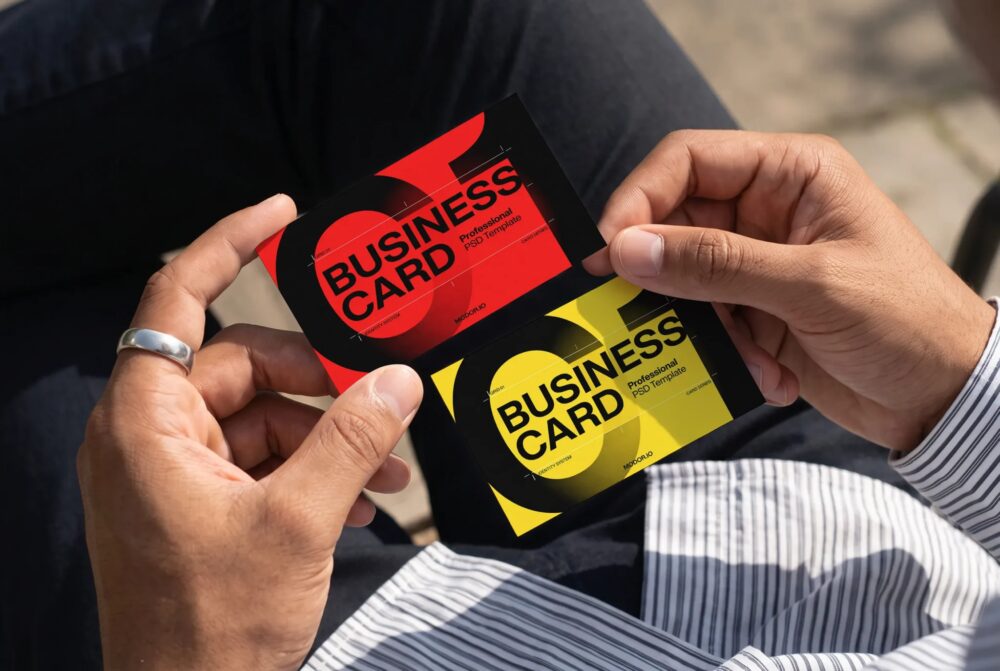 Business Card Mockup Held in Both Hands PSD
