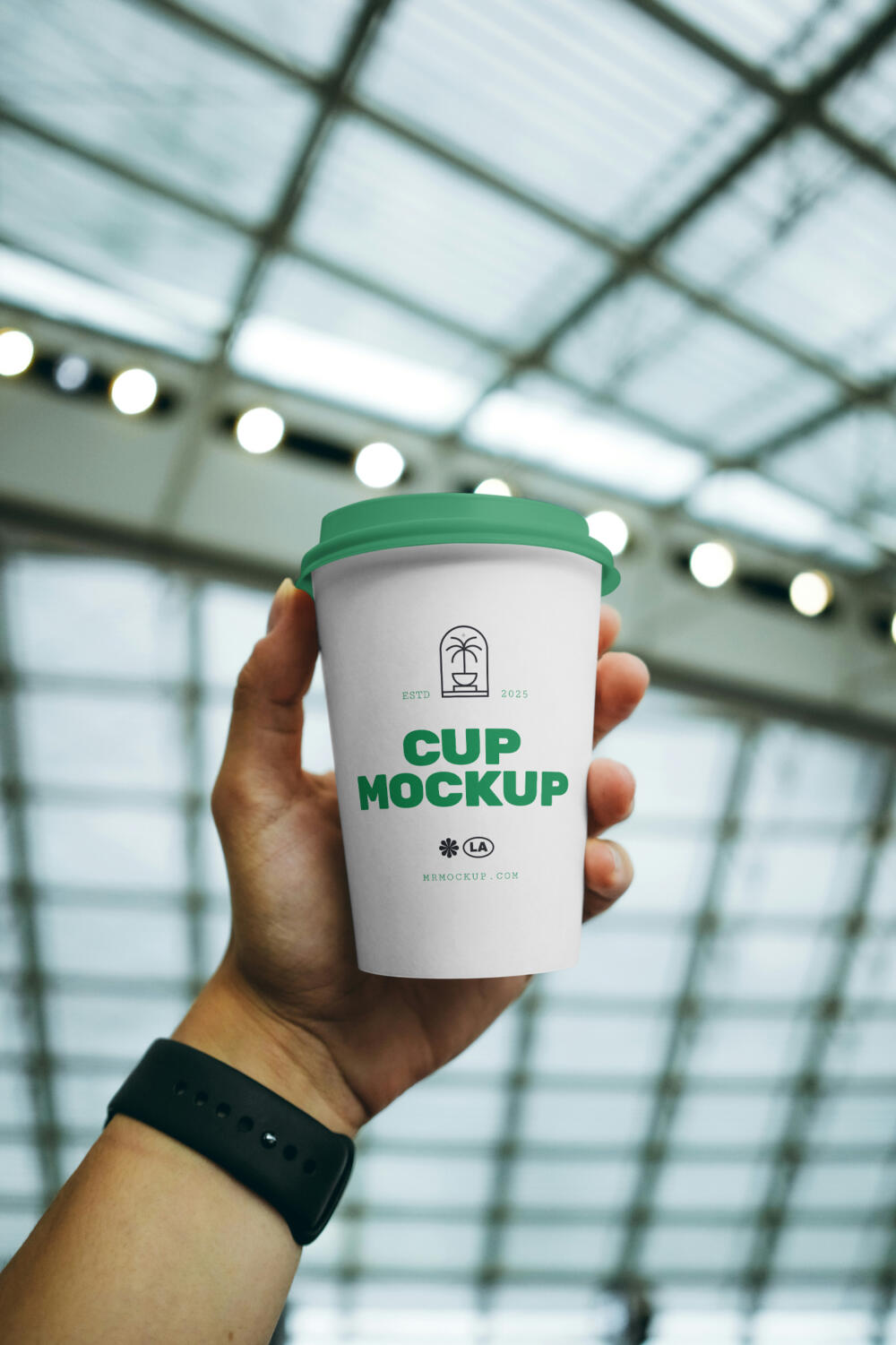 Coffee Cup in Hand Mockup