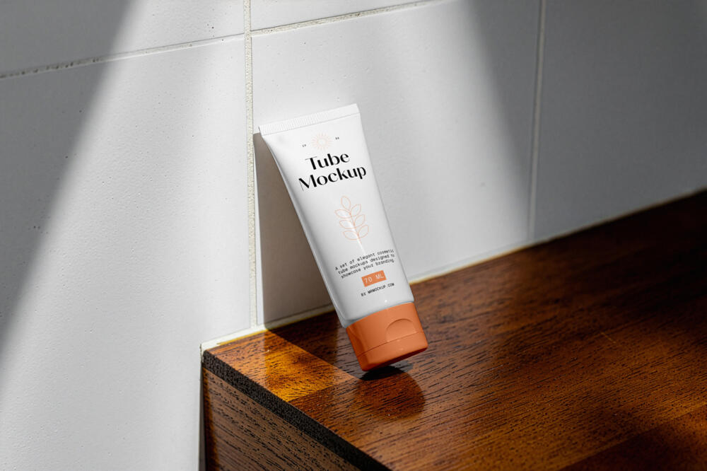 Cosmetic Tube Leans Against The Wall Mockup