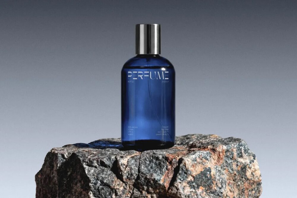 Download Glass Perfume Bottle Mockup on Stone Base