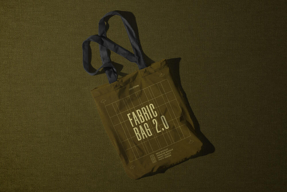 Fabric Bag On Green Background Top View