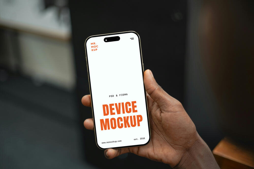 Hand Holding iPhone 16 Pro Mockup