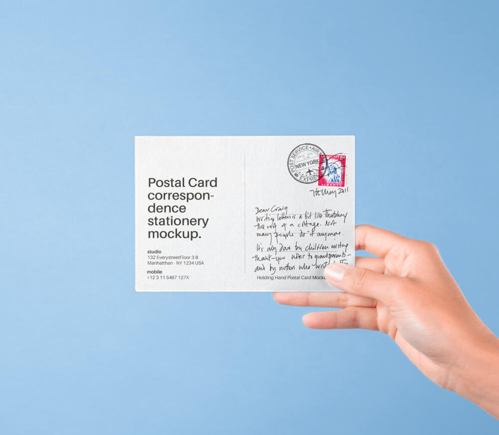 Hand Holding Psd Postal Card Mockup