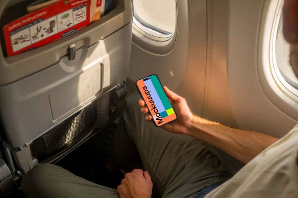 iPhone 14 Pro on a Plane Mockup