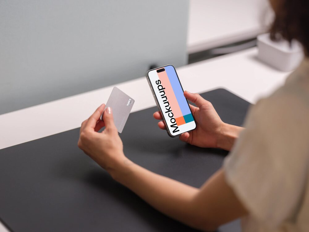 iPhone 15 Pro mockup with credit card in hand