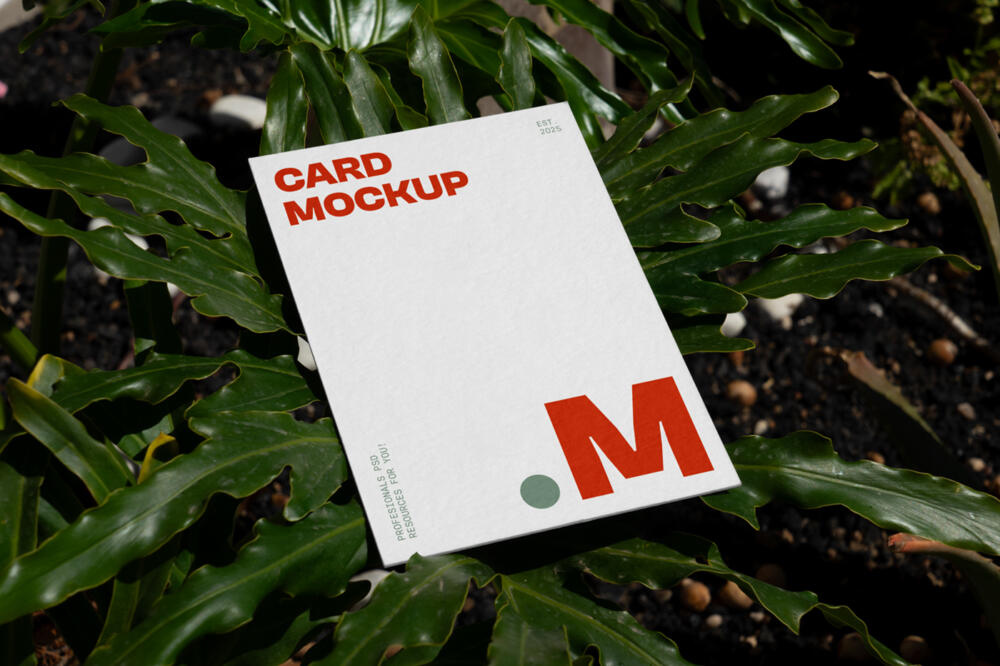 Laying Card Between Flowers Mockup