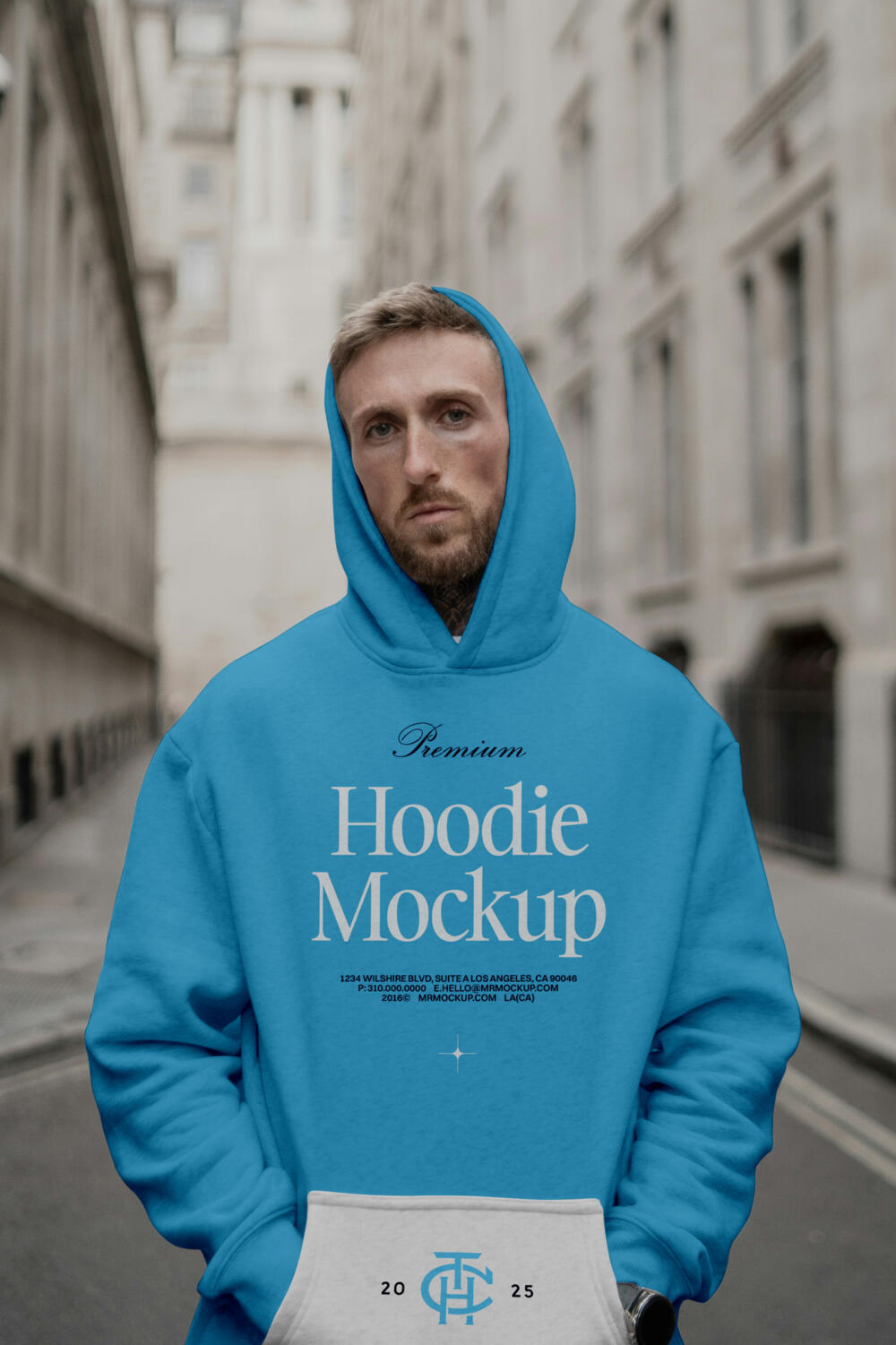 Men Wearing Hoodie Against The City Mockup