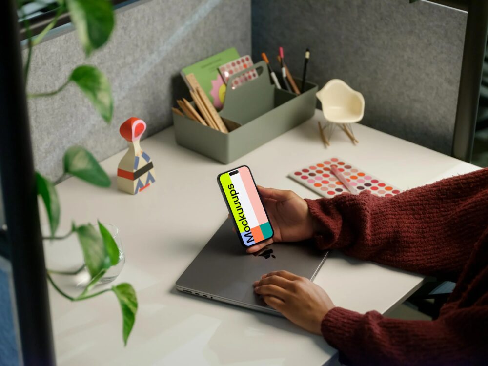 mockup of woman holding iPhone 14 Pro