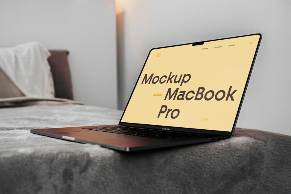 Open MacBook Pro on Bed Mockup