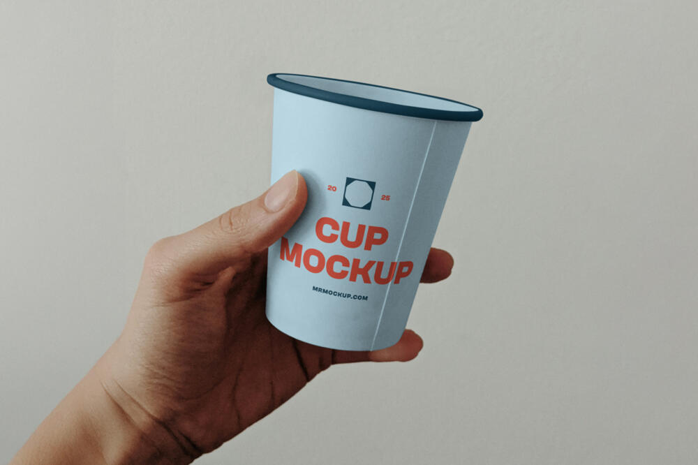Paper Coffee Cup in Hand Mockup