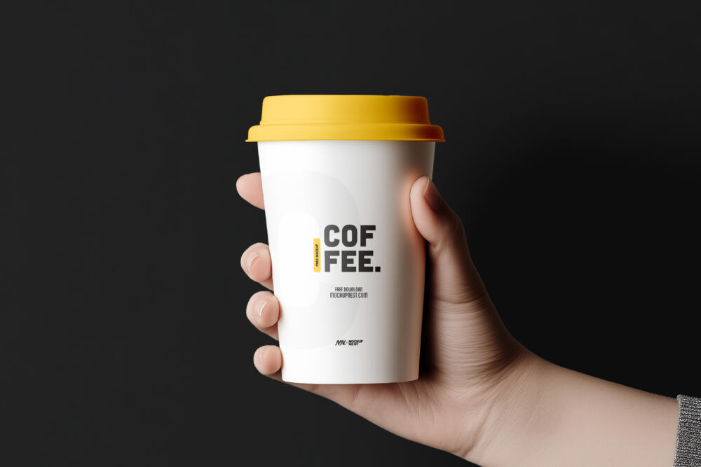 Paper Coffee Cup Mockup Holding By Hand