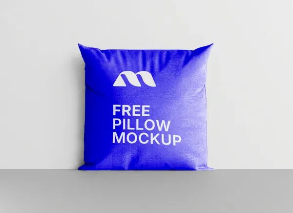 Square Pillow Mockup Standing Upright Against Wall — Studio (PSD)