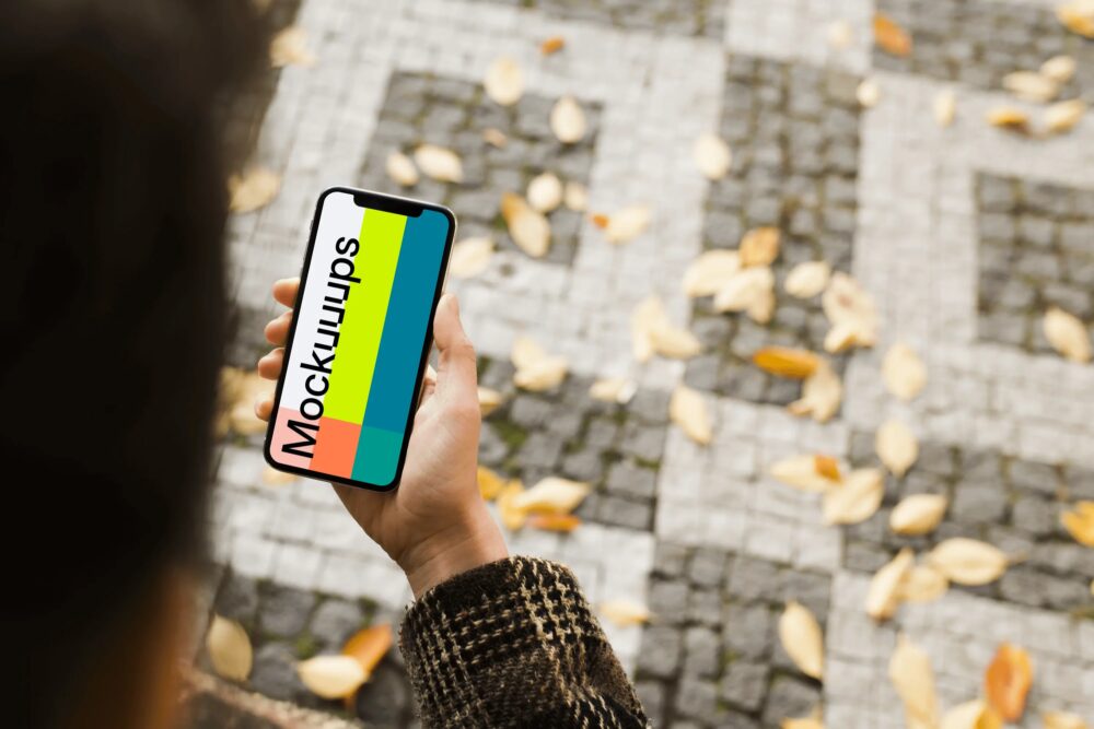 Walking with iPhone X mockup